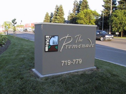 Sign for The Promenade with address details