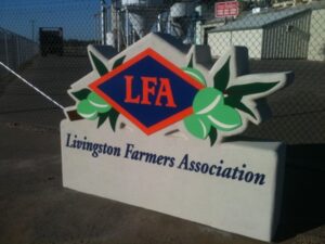 Livingston Farmers Association sign with logo.