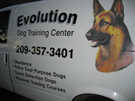 Van advertising Evolution Dog Training Center services.