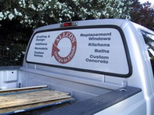 Truck window advertising home renovation services