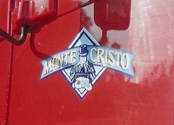 Monte Cristo logo on red background