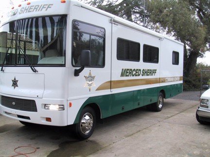 Merced Sheriff mobile command vehicle parked outdoors.